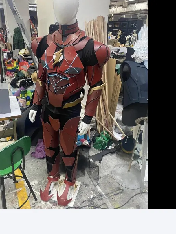 Full Flash armor suit build in progress on a mannequin in the workshop